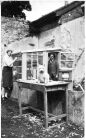 Miss Madeline McClintock and Andy McHugh, in the walled garden.